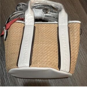 Victoria’s Secret Tan and cream woven crossbody bag with a boho touch